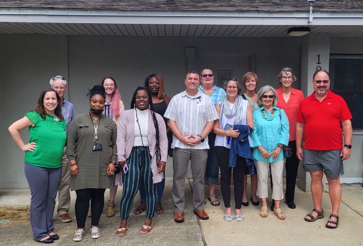 Group photo of Lakeview Center and Central Church Pensacola Beach representatives.