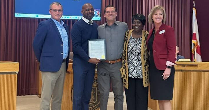Pensacola City Council President Delarian Wiggins presents proclamation for National Disability Employment Awareness Month to team members from Global Connections to Employment (GCE). GCE is one of the country’s largest private employers of persons with disabilities and is based in downtown Pensacola.