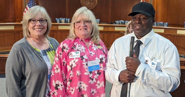 Betty, Dawn and Patrick accepting recognition