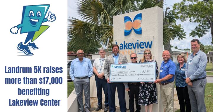 Lakeview Center and LandrumHR leaders pose with Landrum HR 5K presentation check.