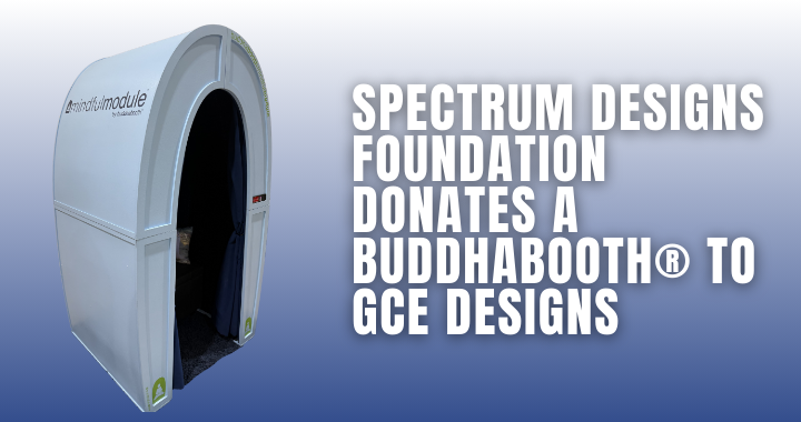 This image depicts a BuddhaBooth®, which is a large blue structure shaped like an upside down "U". The image has text that reads: "Spectrum Designs Foundation Donates a BuddhaBooth® to GCE Designs."