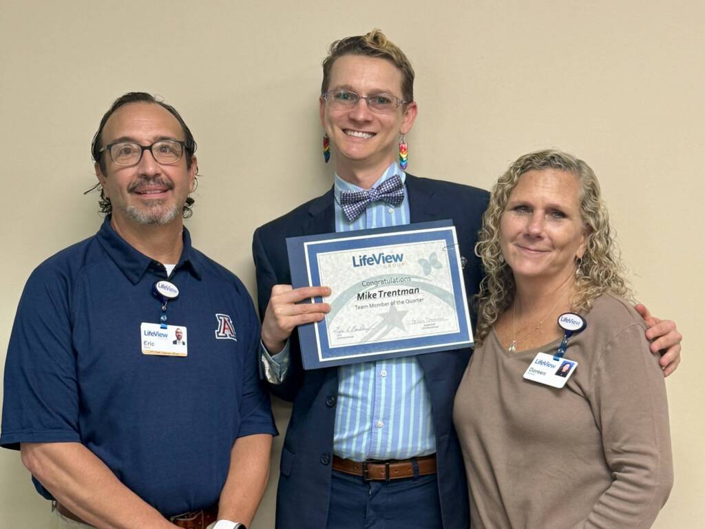 CFO Eric Barley, Team Member of the Quarter Mike Trentman and Controller Doreen Drimmie